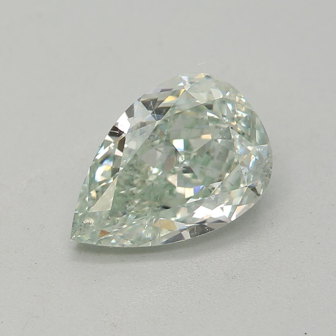 Certificate: GIA 
Report Number: 7372759178
Shape And Cut: Pear
Carat Weight: 0.95 carat
Measurements: 7.71 x 5.31 x 3.27 mm
Color Grade: Fancy Light Green

FEATURES OF THE DIAMOND:

This Fancy Light Green Diamond is a rare and captivating diamond