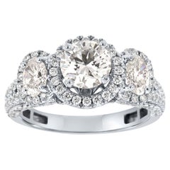 GIA Certified 0.95 Carat Round Shape 18K WG Halo Three-Stone Diamond Ring