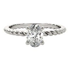Bague en platine certifiée GIA de 0.95 carats, solitaire ovale à anneau torsadé