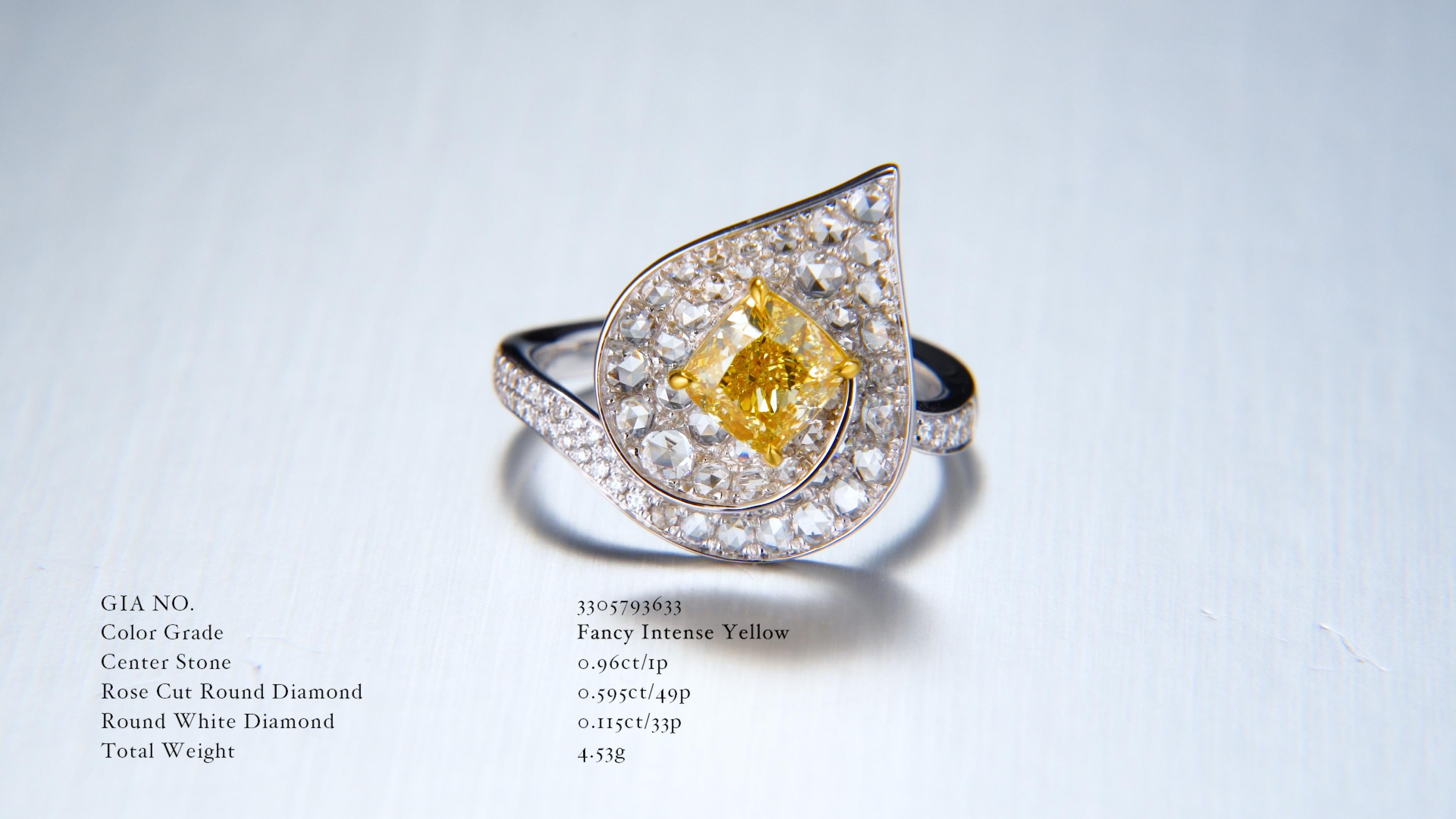 Bague en diamant certifié GIA de 0,96ct Natural Fancy Intense Yellow, un témoignage envoûtant de la beauté des pierres rares. Cette bague extraordinaire, méticuleusement réalisée en or 18kt, respire l'élégance et la sophistication à chaque