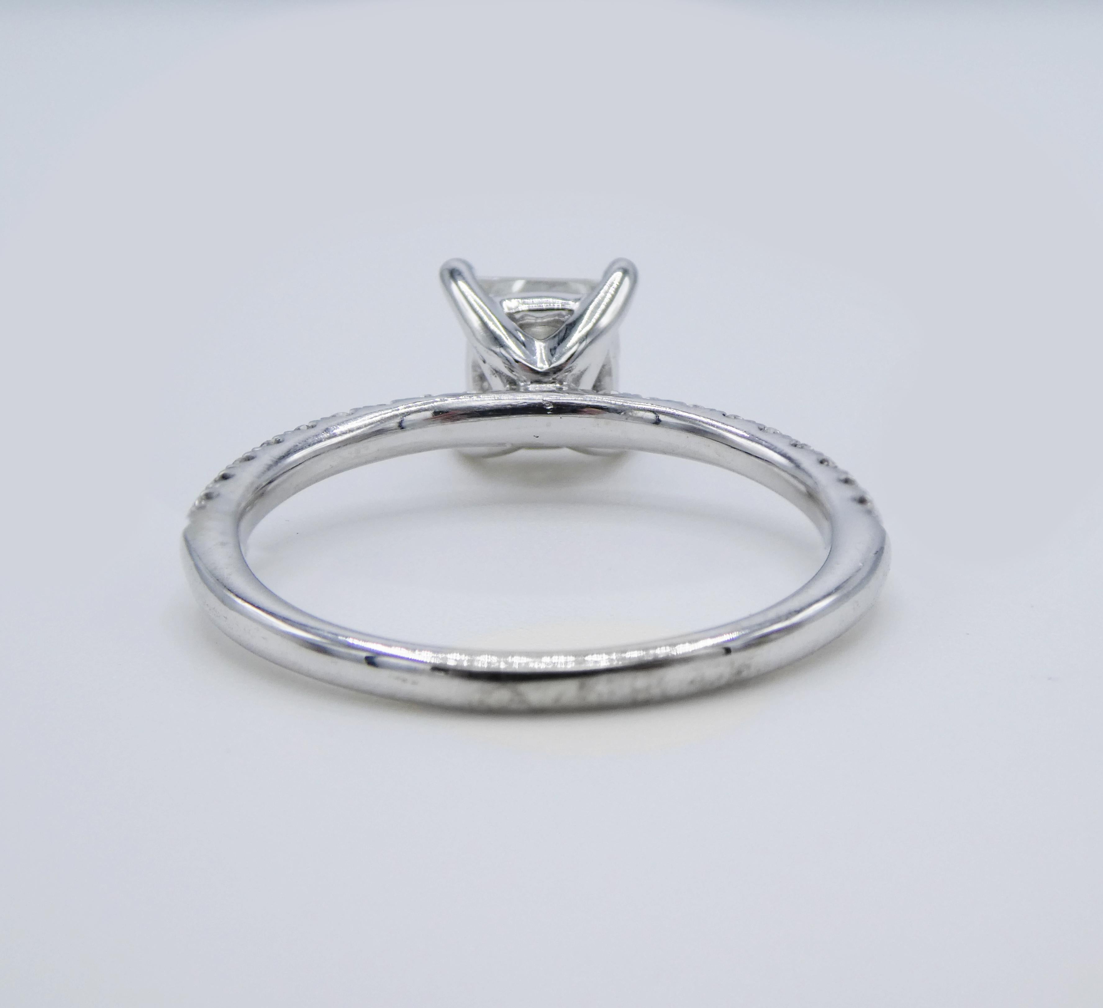 pave solitaire engagement ring