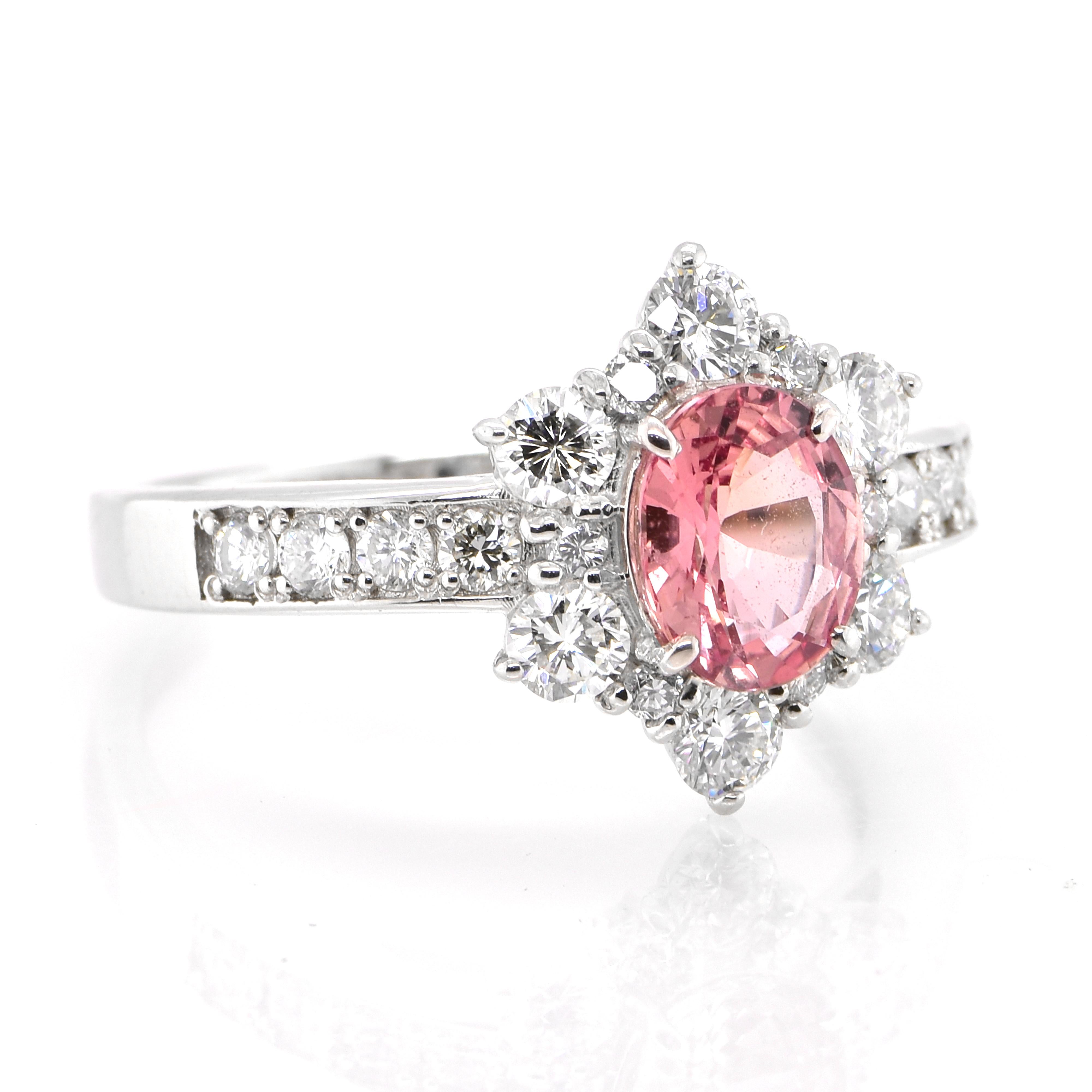 Modern GIA Certified 0.99 Carat Padparadscha Sapphire and Diamond Ring set in Platinum For Sale