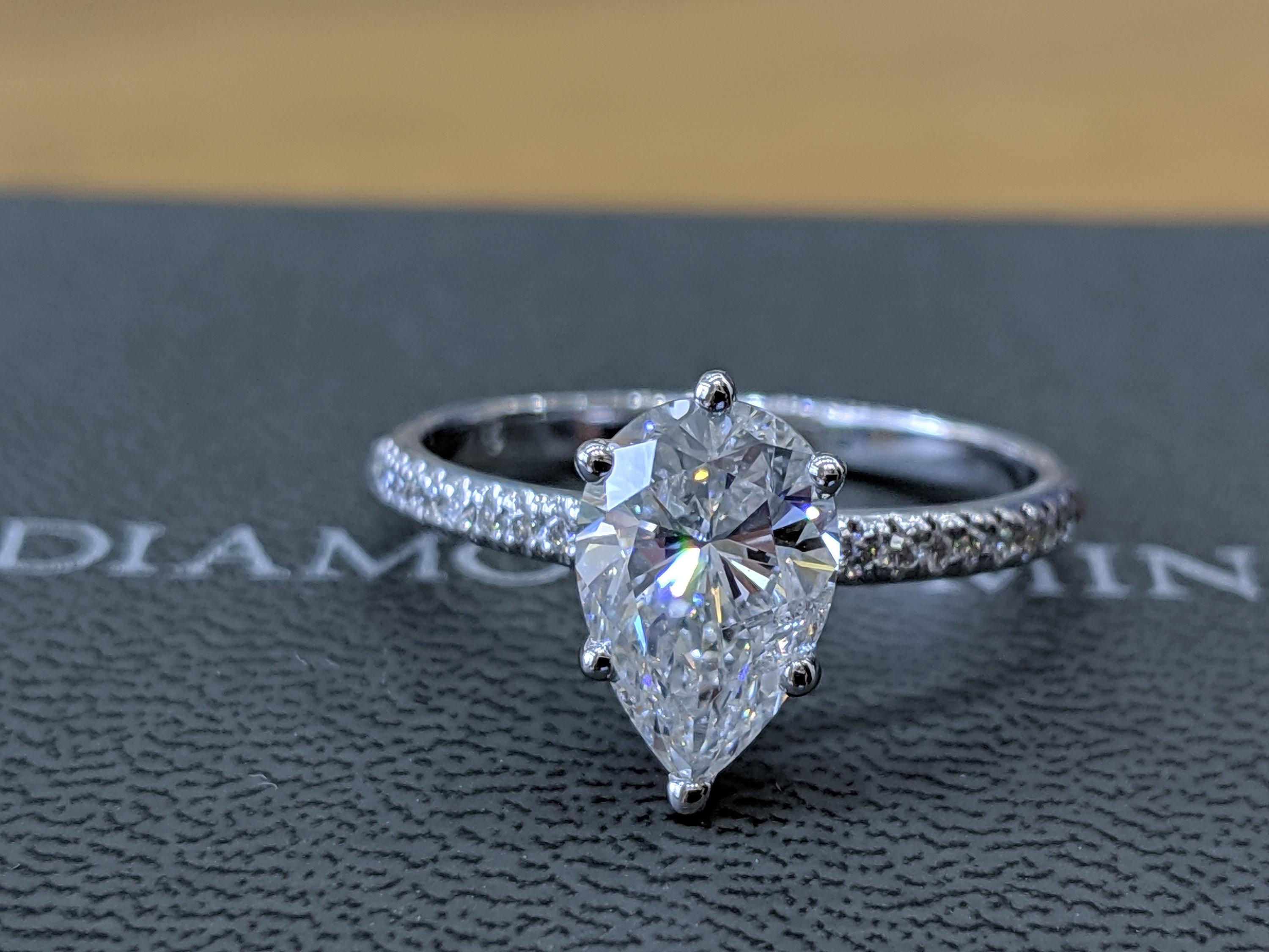 Art Deco GIA Certified 1 1/2 Carat 14 Karat White Gold Pear Diamond Engagement Ring