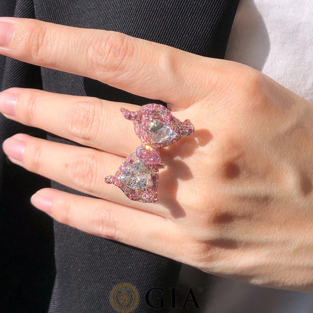 Bague à nœud en diamant rose orangé clair fantaisie taille poire de 1 carat certifié GIA en vente 1