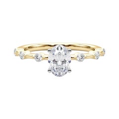 Anello di diamanti con gambo di bambù e diamante ovale da 1 carati certificato GIA