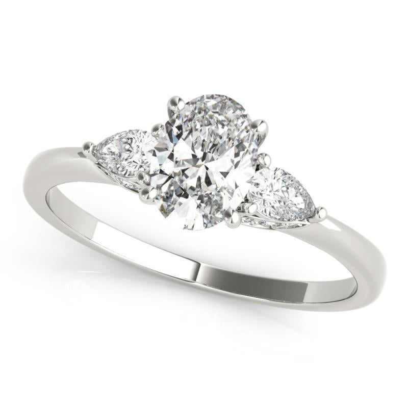 Taglio ovale GIA Certified 1 Carat Oval & Pear Three-Stone  Diamond Ring in vendita