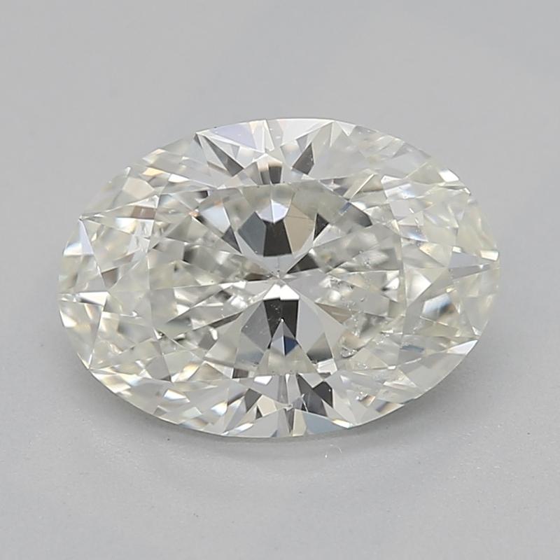 Eleva tu colección de joyas con este impresionante anillo de diamantes con una extraordinaria piedra central oval J SI2 1. Engarzada en un refinado diseño de garras elevadas, la pieza central se complementa con un lustroso conjunto de diamantes