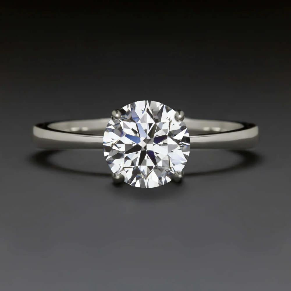 Contemporaneo GIA Certified 1 Carat Round Brilliante H SI2 Diamond Solitaire Anello in oro bianco in vendita