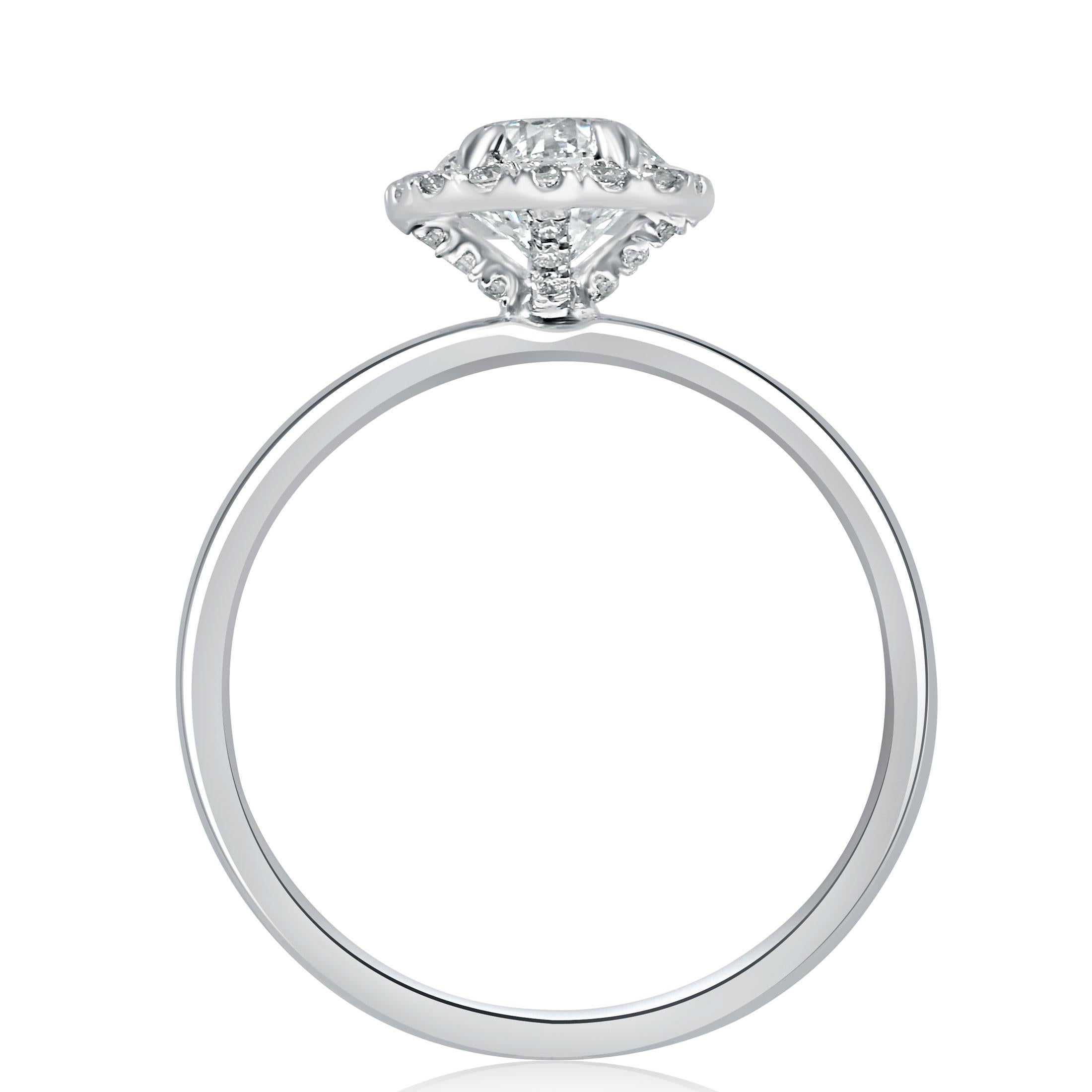 Promise her your love with this exquisite solitaire engagement ring. This elegant piece features a stunning 1.00 carat round cut diamond, graded H color and I1 clarity, displayed in a secure four-prong setting that is incrusted with diamonds,