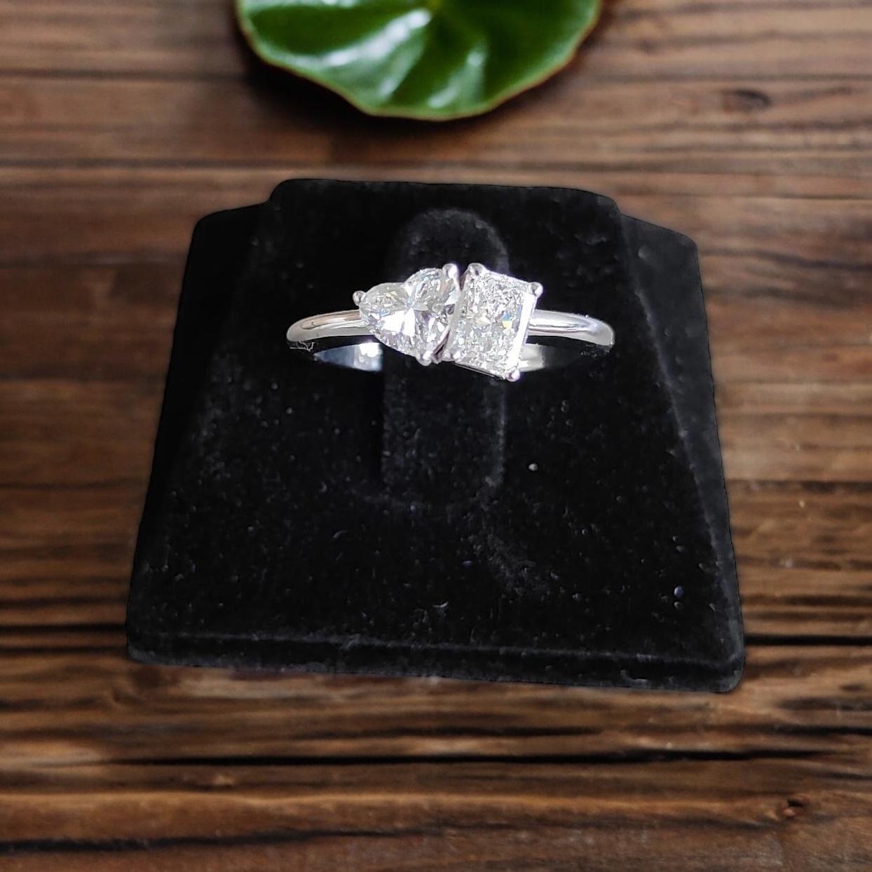All good things are made of sparkling diamonds and gold. Make this exclusive GIA Certified 1 Carat F/VS1 Heart and Radiant Shape Natural Diamond Toi et Moi Ring in 18K White Gold yours!

Specifications : 
Diamond Color : White
Diamond Weight : 1 Cts
