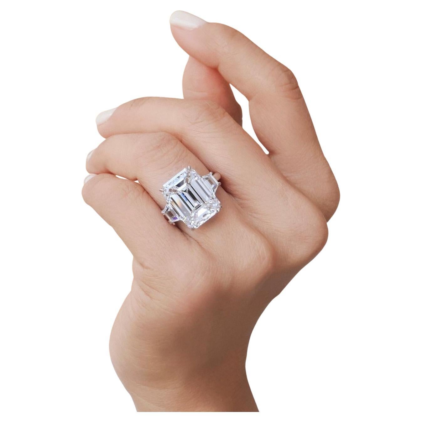 GIA Certified 4 Carat Emerald Cut Trapezoid Three Stone Platinum Ring