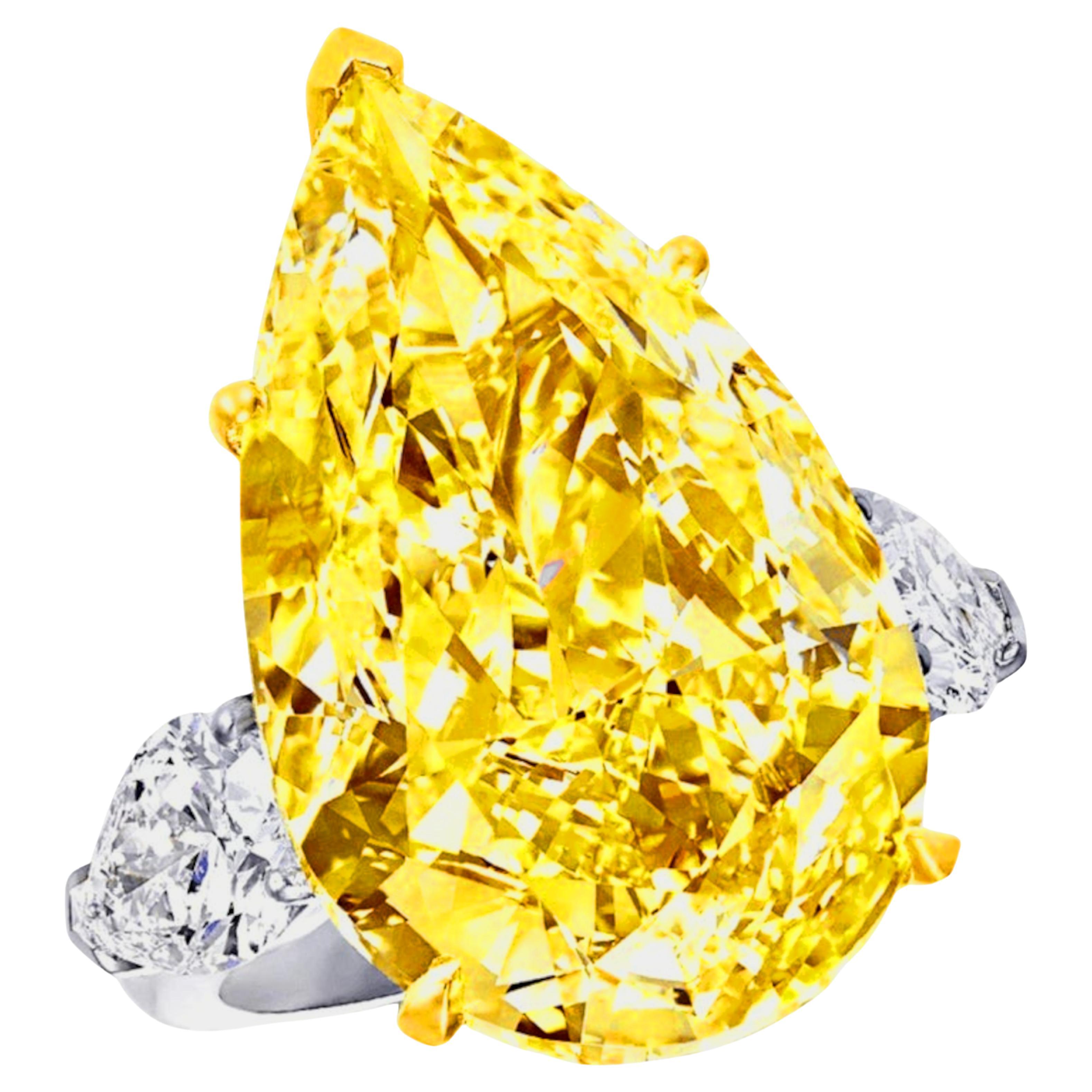 GIA Certified 11.83 Carat Fancy Yellow Pear Cut Diamond Platinum Ring In New Condition In Chicago, IL