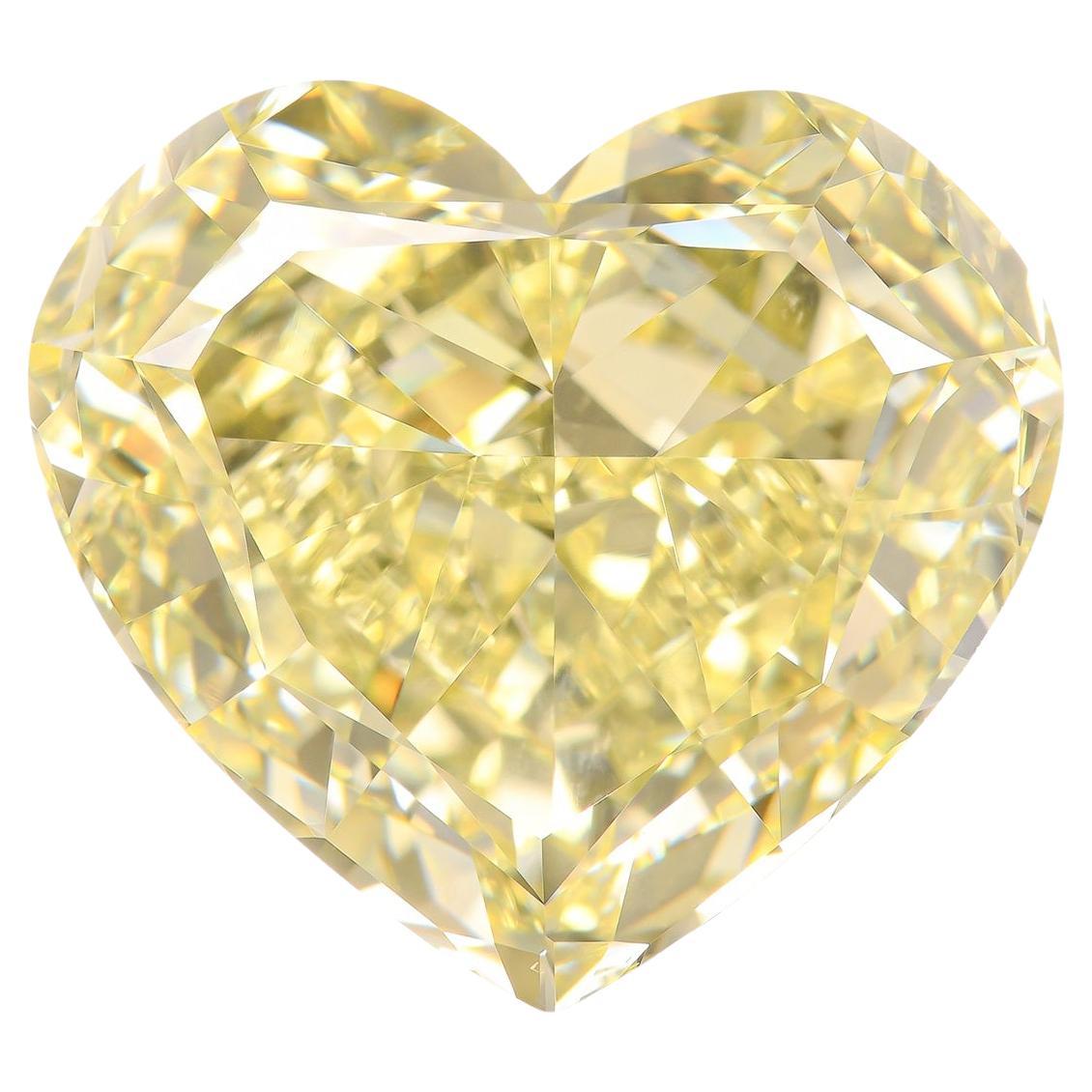 Stunning 10.14 Carat Fancy Yellow Heart-Cut Diamond Solitaire Ring in 18K White Gold

This breathtaking solitaire ring showcases a remarkable 10.14-carat heart-shaped modified brilliant diamond, GIA certified for its exceptional quality. The diamond