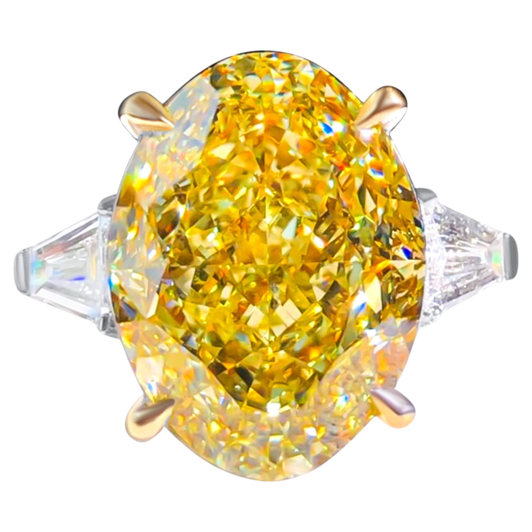 GIA Certified 10 Carat Oval Cut Fancy Yellow Diamond 3-Stone Engagement Ring For Sale