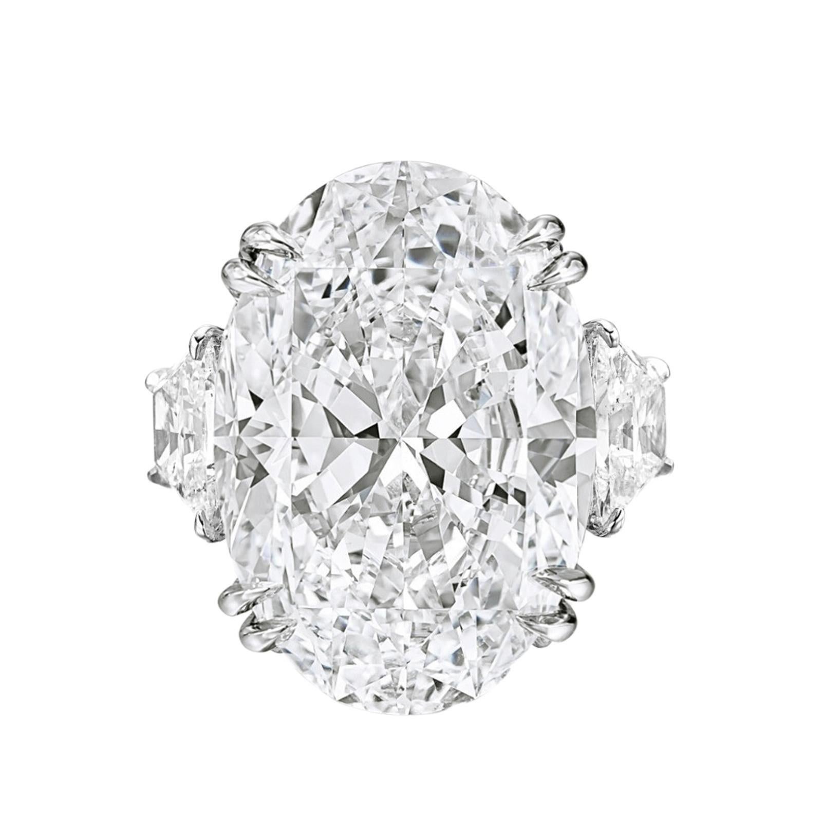This exquisite ring by Cecile Blake is crafted in platinum and features a stunning 10-carat oval brilliant-cut diamond as its centerpiece. The diamond is GIA certified, showcasing exceptional quality with the following attributes:

Carat Weight: 10