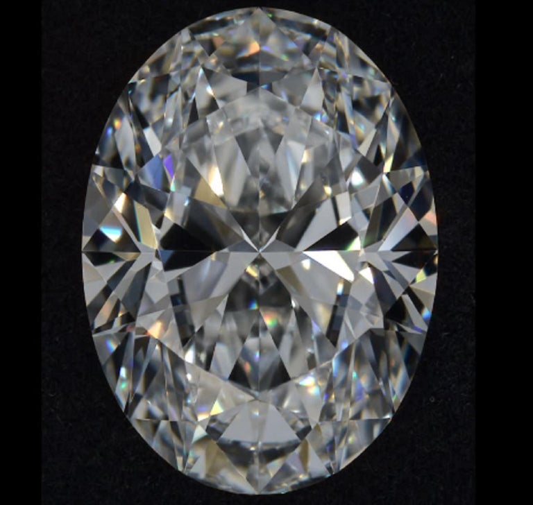 Modern GIA Certified 10 Carat Oval Diamond VVS1 Clarity D Color Triple Excellent Cut For Sale