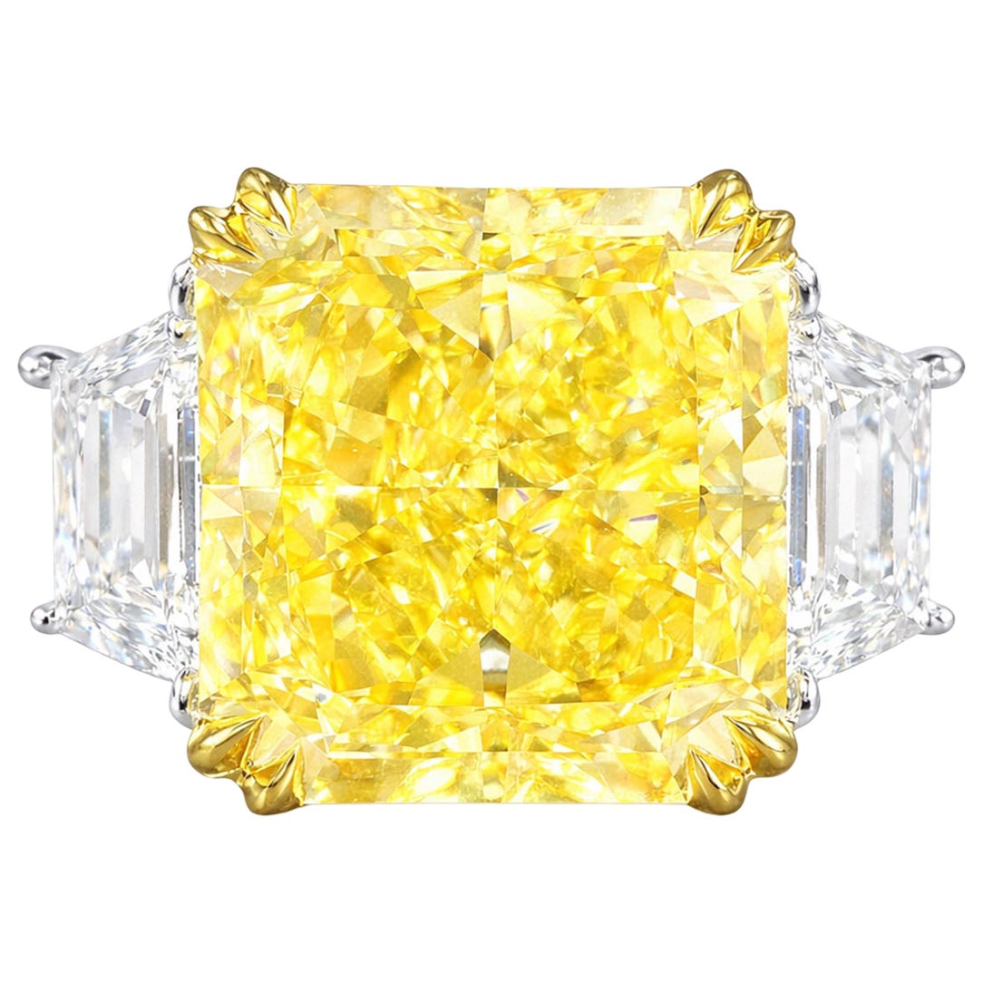 GIA Certified 10 Carat Radiant Cut Fancy Yellow Diamond with Trapezoid on side
