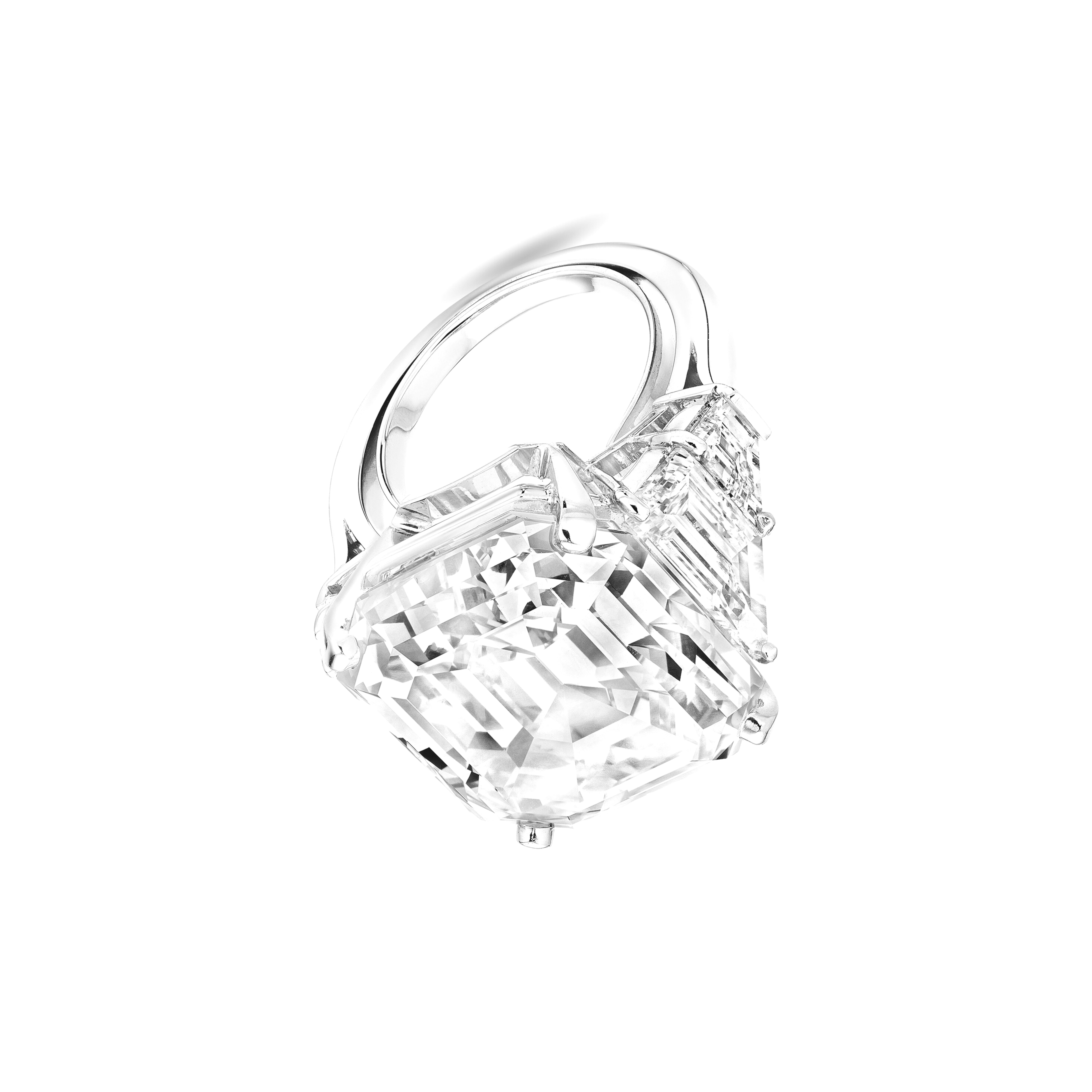 GIA Certified 10 Ct. Square Emerald Cut Diamond Ring, elegantly set in luxurious platinum. This stunning piece features two beautiful tapered baguette diamonds, showcasing  h color and vs1 clarity, enhancing the ring's brilliance and sophistication.
