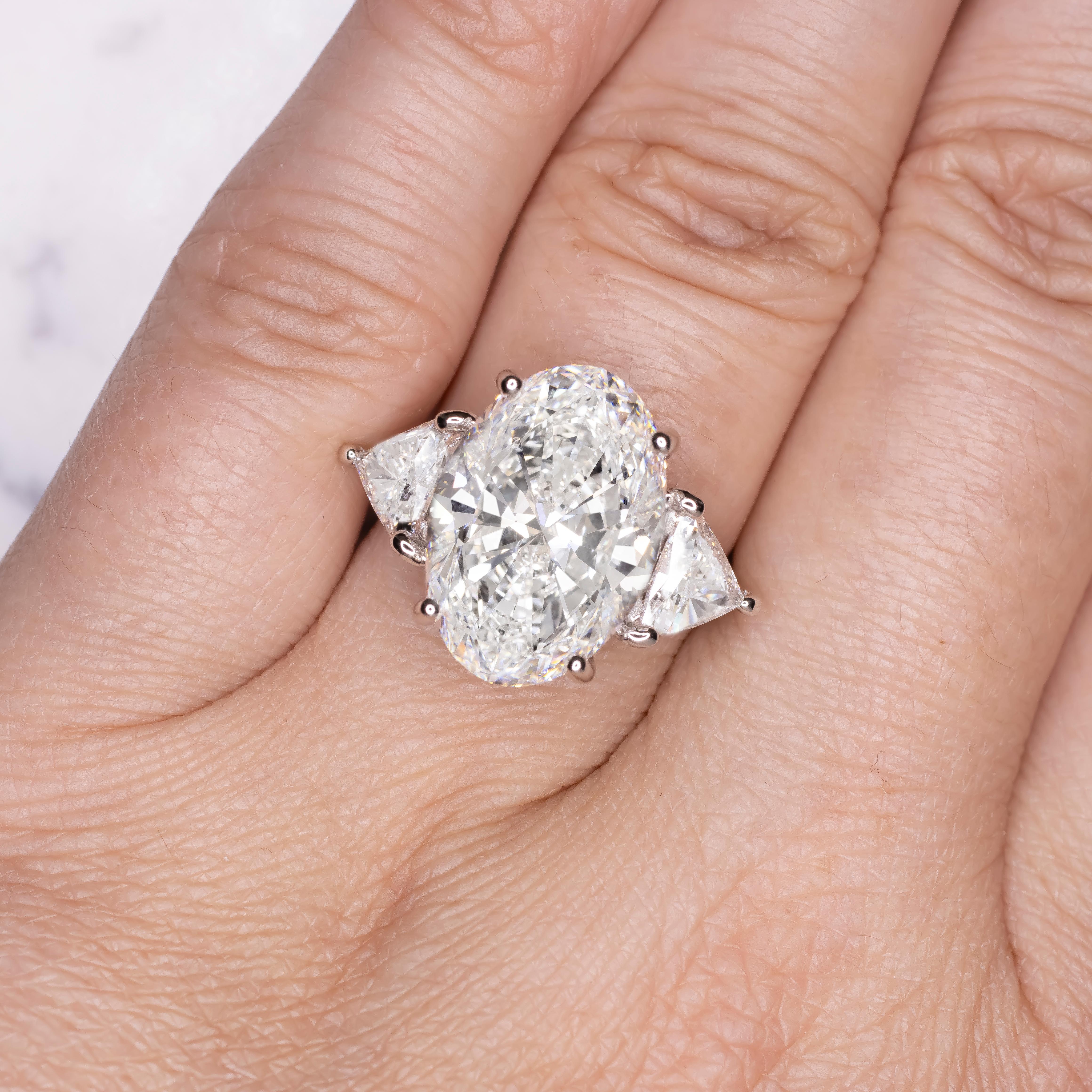 Oval Cut GIA Certified 10.01 Oval Diamond Ring with Trillion Diamond in Platinum For Sale