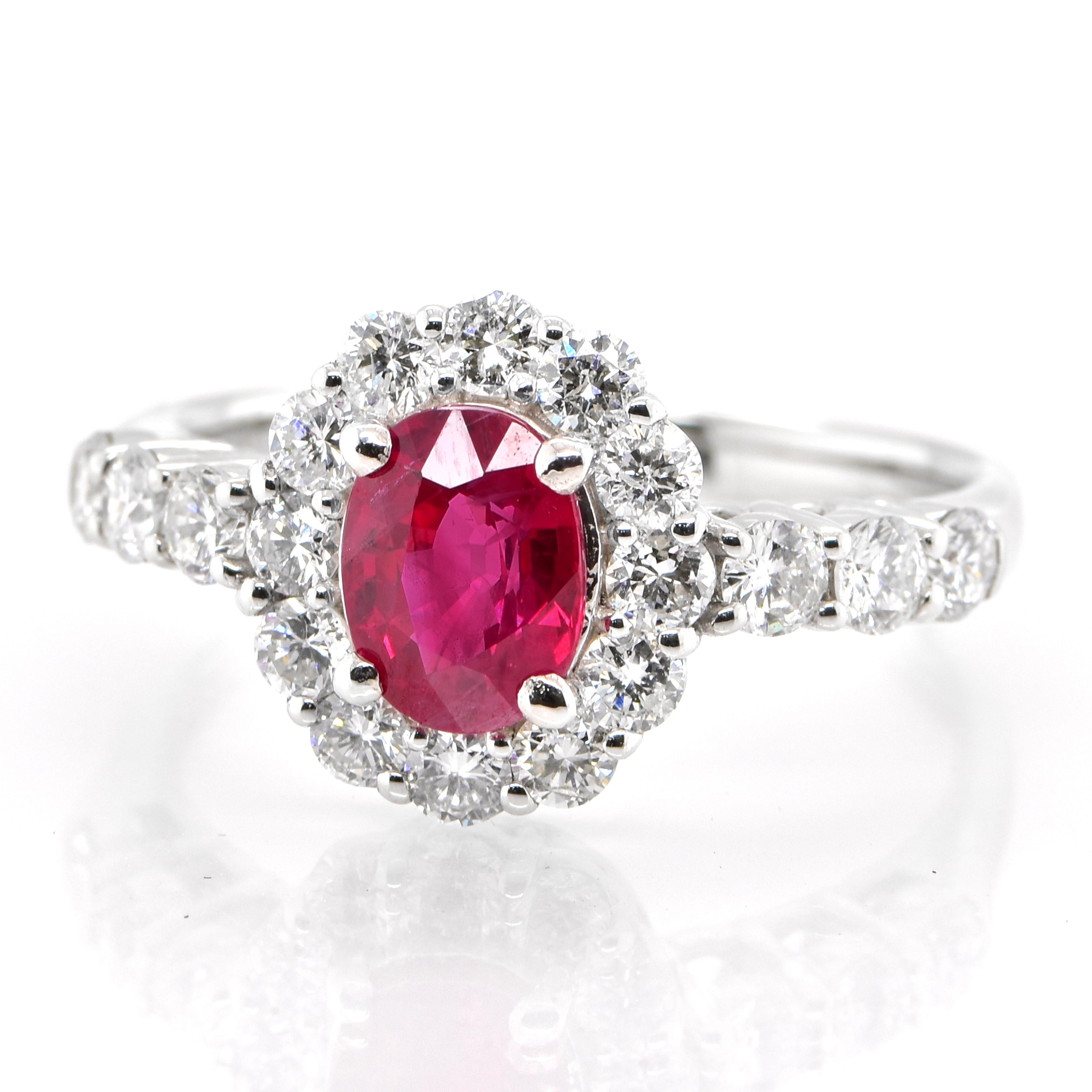 A beautiful Ring set in Platinum featuring a GIA Certified 1.00 Carat Natural Burmese Ruby and 0.89 Carat Diamonds. Rubies are referred to as 