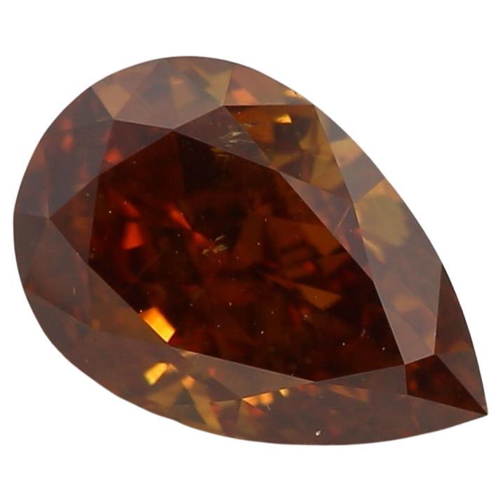 Certificate: GIA
Report Number: 6315064724
Shape And Cut: Pear
Carat Weight: 1.00carat
Measurements: 7.74 x 5.27 x 3.37 mm
Color Grade: Fancy Deep Orange Brown

This 1 carat diamond refers to the weight of the diamond, not its physical size. It's a