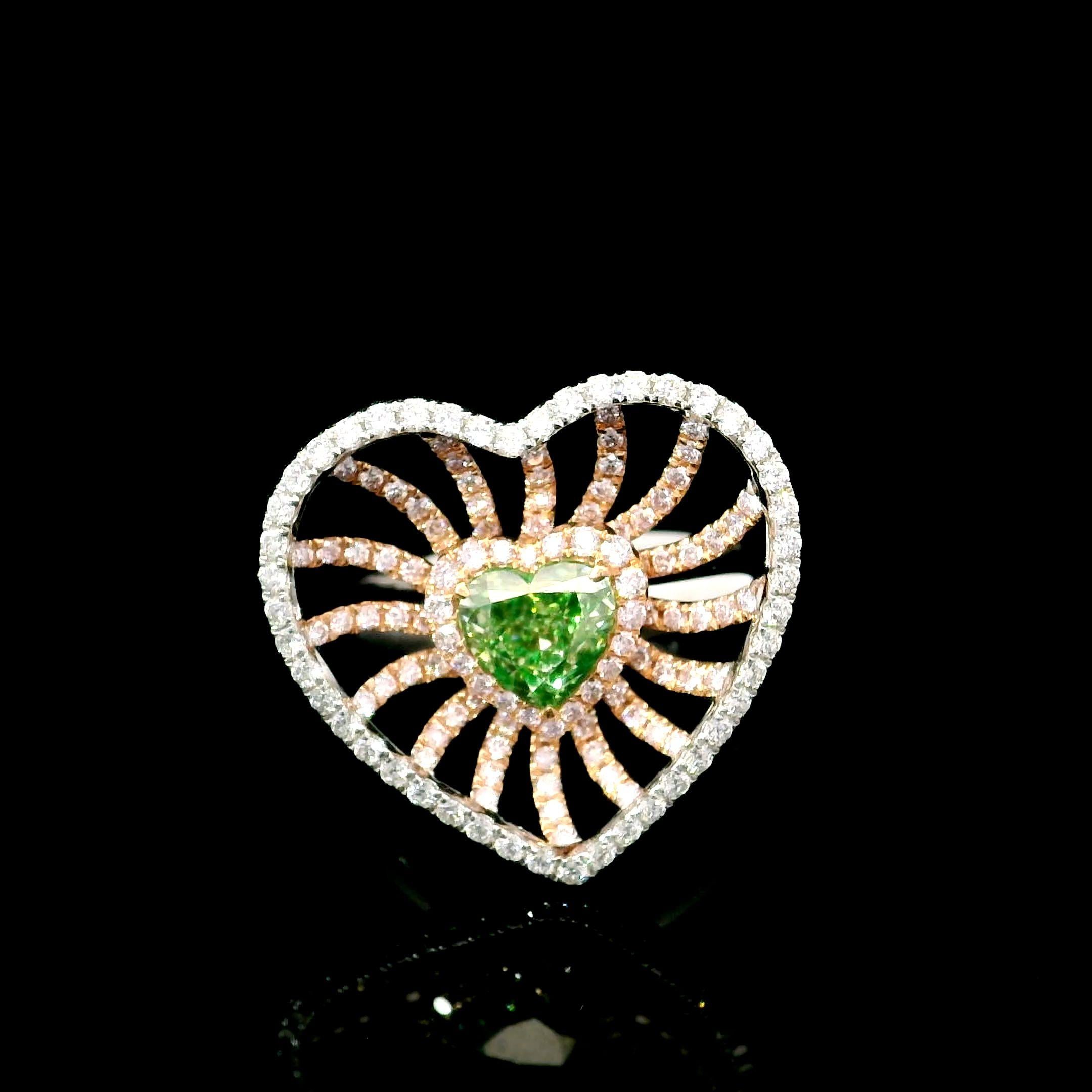 Anillo de oro blanco de 18 quilates con diamantes
  
  Color y quilates del oro Oro blanco 18 quilates
  Peso: 5,89 gramos
  
  Set con-
  Tipo de piedra: Diamantes
  Forma Corazón
  Quilate: 1,00
  Color: Amarillo verdoso fantasía
  Claridad: VS1
 