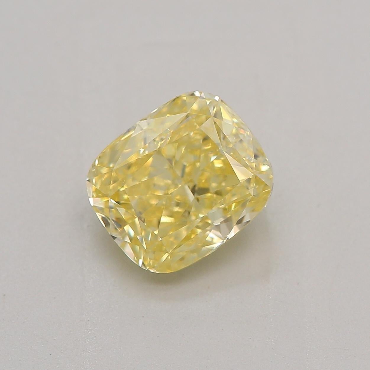 Certificate: GIA 
Report Number: 5221792852
Shape And Cut: Cushion
Carat Weight: 1.00 carat
Measurements: 6.04 x 5.15 x 3.6 mm
Color Grade: Fancy Intense Yellow

FEATURES OF THE DIAMOND:
 
This Fancy Intense Yellow Diamond is a rare and vibrant