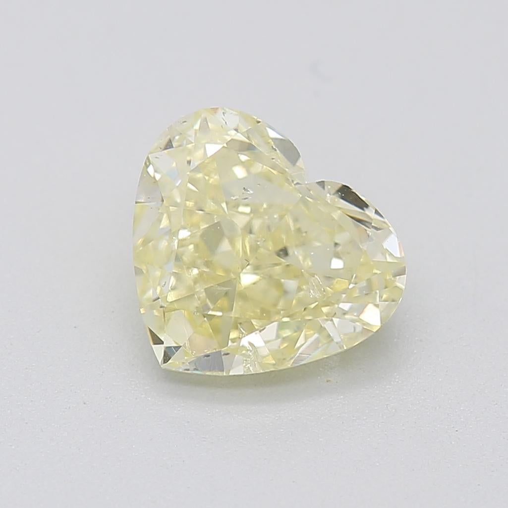 Certificate: GIA 
Report Number: 1393152993
Shape And Cut: Heart
Carat Weight: 1.00 carat
Measurements: 5.86 x 6.64 x 3.45 mm
Color Grade: Fancy Light Yellow

FEATURES OF THE DIAMOND:

This Fancy Light Yellow diamond is a breathtaking diamond, known