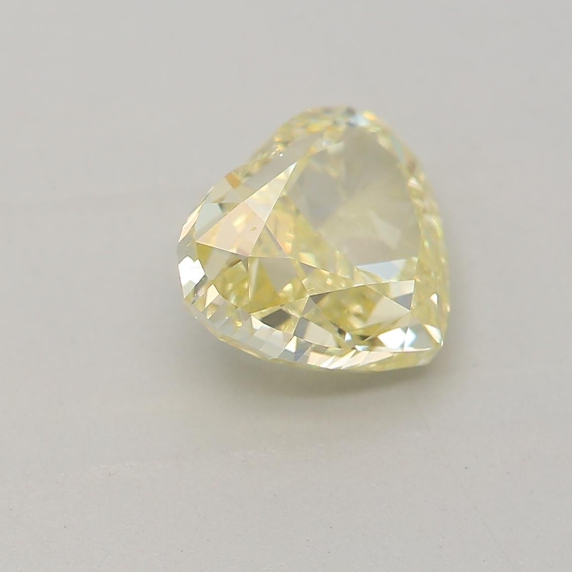 Heart Cut GIA Certified 1.00 Carat Fancy Light Yellow VS1 Clarity Diamond For Sale