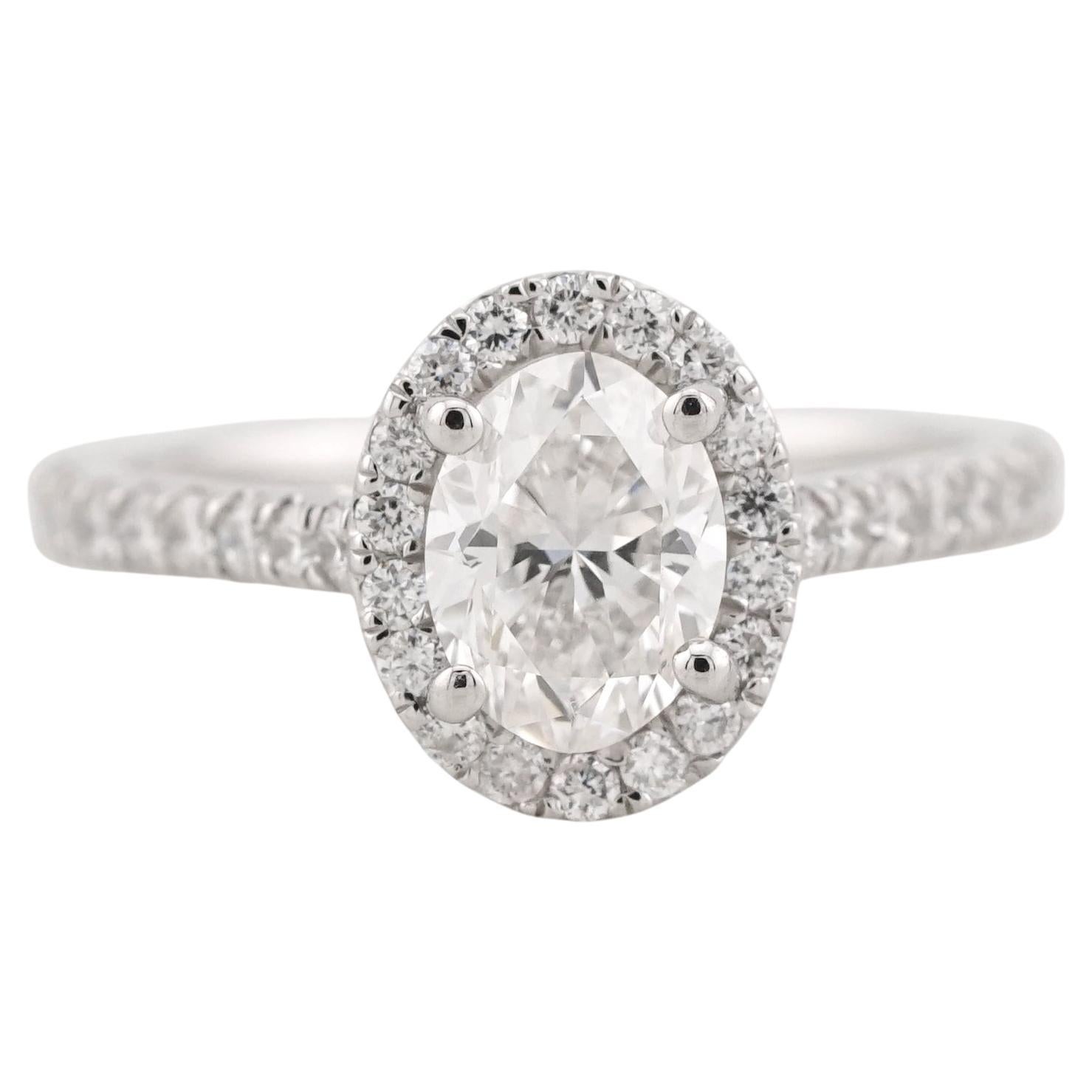 GIA Certified 1.00 Carat H VS2 Oval Diamond Halo Platinum Ring