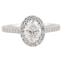 Anello in platino con diamante ovale aureolato certificato GIA da 1,00 carati H. H. VS2