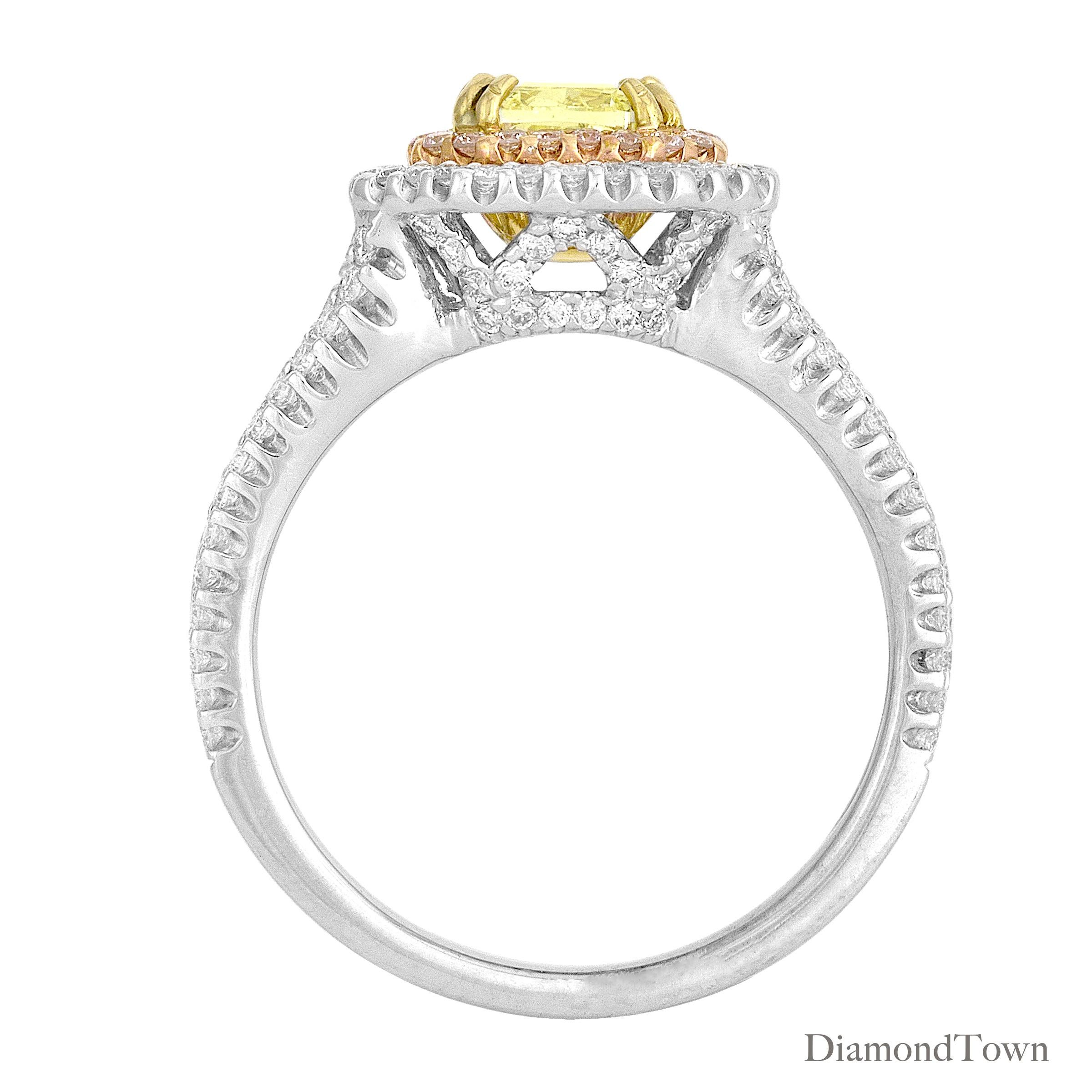 (DiamondTown) This gorgeous ring has a GIA Certified Oval Cut Natural Fancy Yellow center measuring 1.00 carats, surrounded by a double halo of round white diamonds. Additional diamonds decorate the three-track side shank, and a detailed under