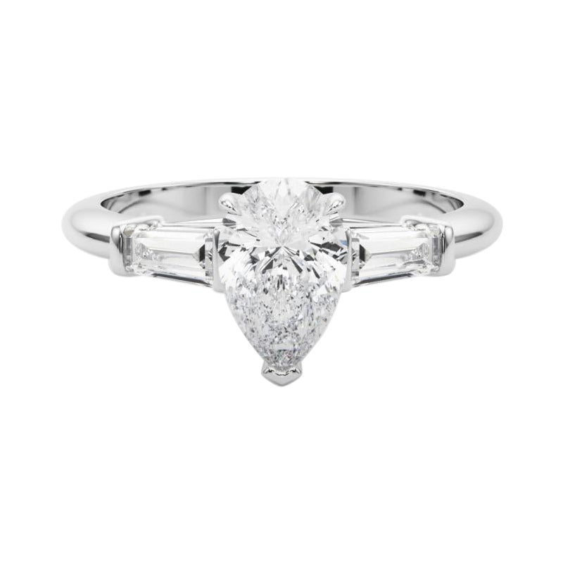 Anello di diamanti a tre pietre con pera e baguette certificato GIA da 1,00 carati