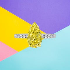 GIA Certified 1.00 Carat Pear Shape Fancy Vivid Yellow Diamond Ring