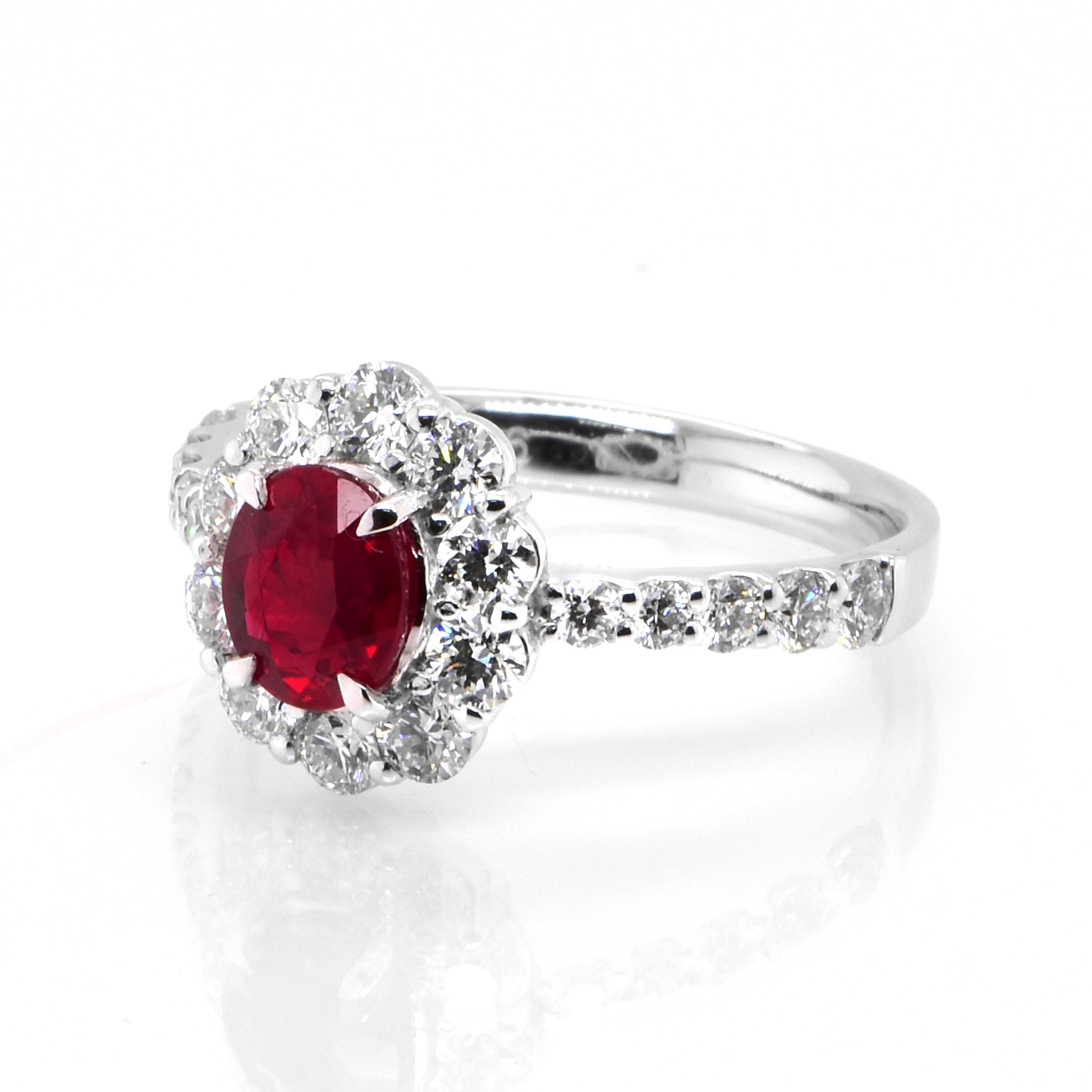 A beautiful Ring set in Platinum featuring a GIA Certified 1.00 Carat Natural, Pigeons Blood Red, Burmese Ruby and 0.96 Carat Diamonds. Rubies are referred to as 