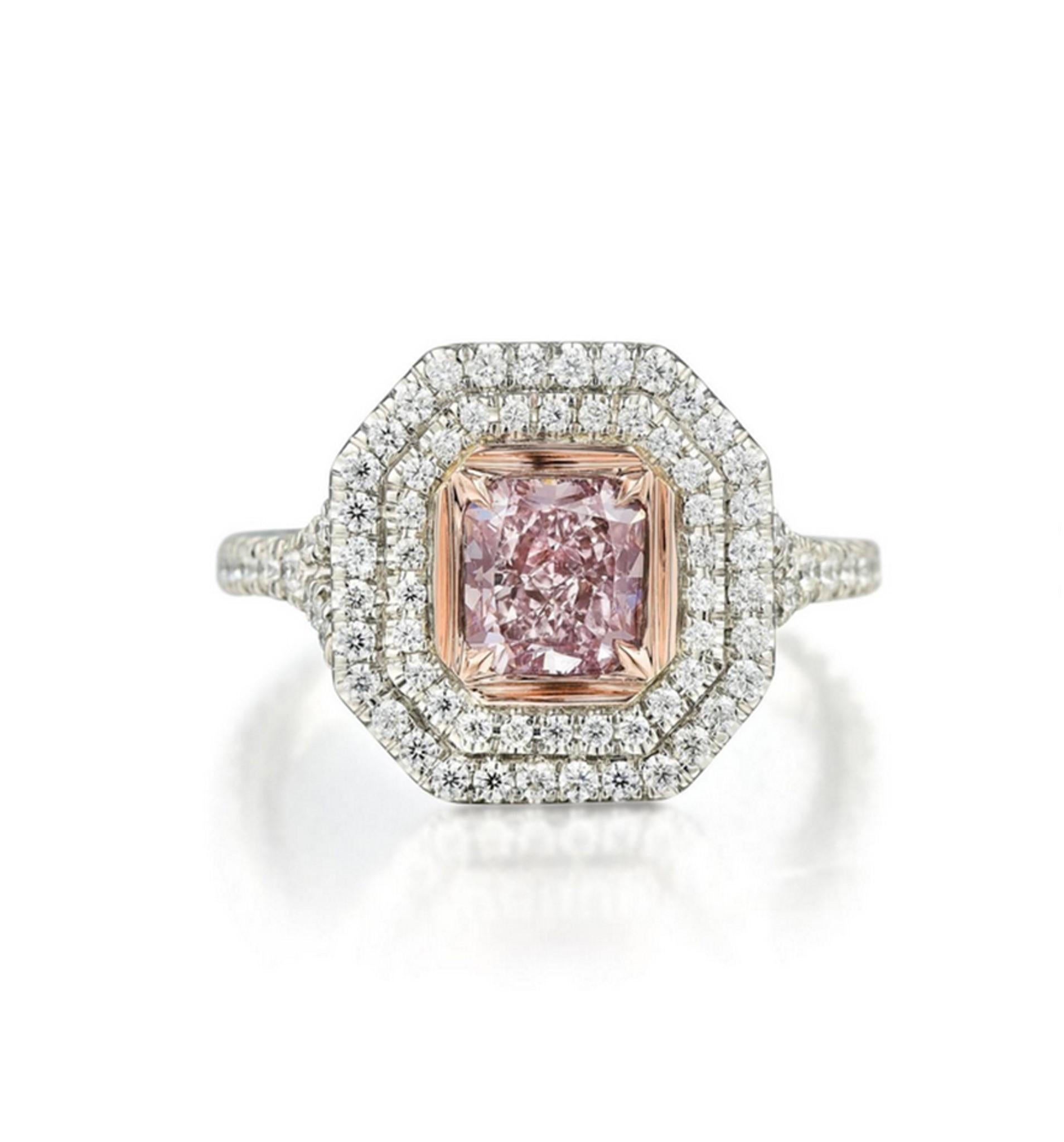 Incredible Deal on GIA Certified 1.00 carat Radiant Cut,  Natural Fancy Purple-Pink Even Diamond Ring, SI1 clarity, measuring 5.71-5.32x3.52. Total Carat Weight on the ring is 1.60.
GIA CERTIFICATE #1182670842 . This classic contemporary mounting