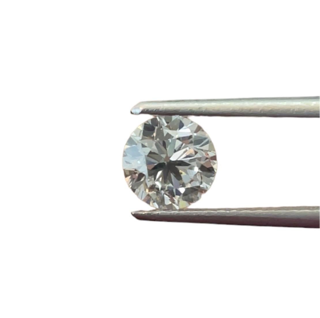 ITEM DESCRIPTION

ID #: NYC56294
Stone Shape: ROUND BRILLIANT
Diamond Weight: 1.00ct
Clarity: SI2
Color: L, Faint Brown
Cut:	Good
Measurements: 6.17 - 6.22 x 4.00 mm
Depth %:	64.6%
Table %:	56%
Symmetry: Fair
Polish: Good
Fluorescence: