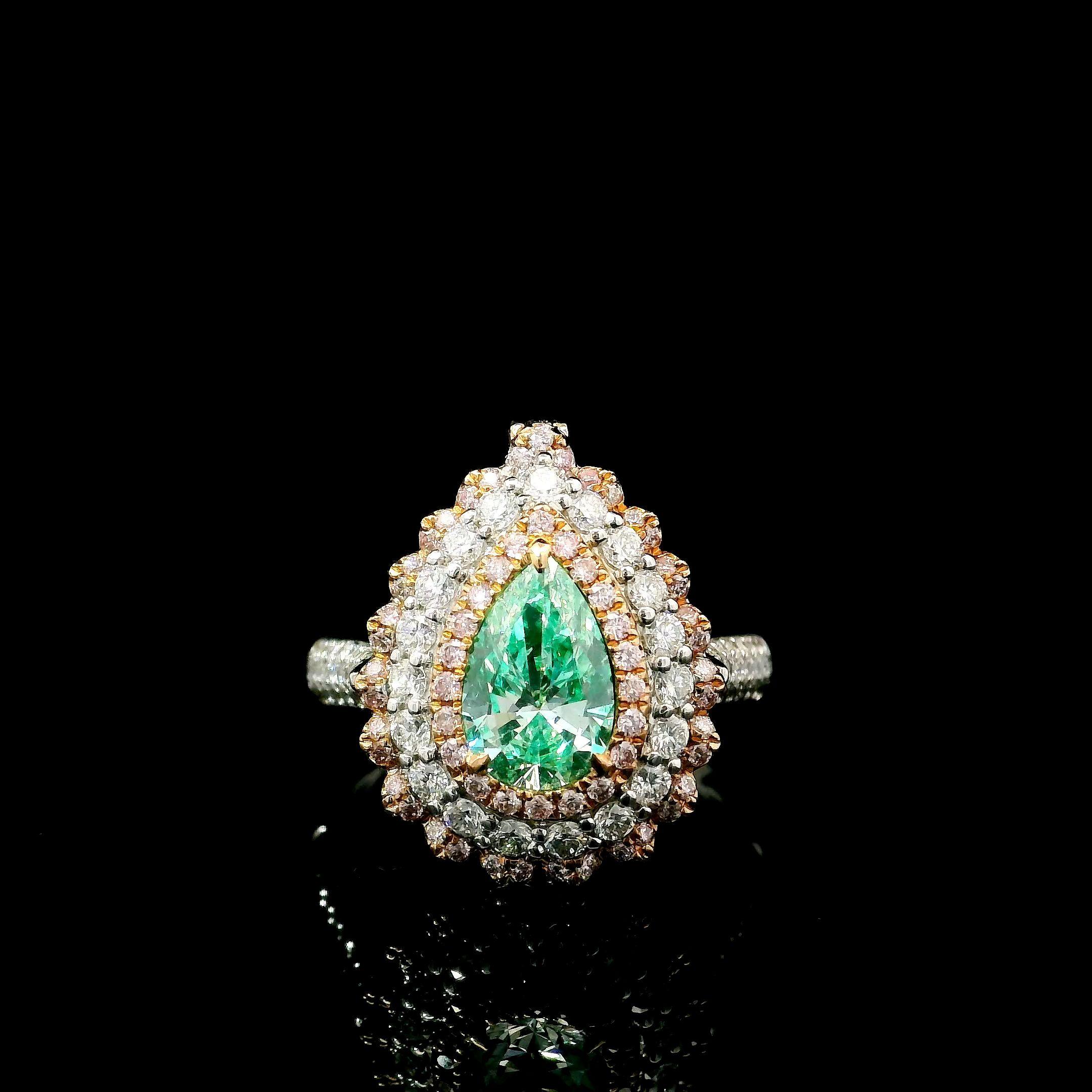 18kt white gold ring with diamonds
  
  Gold colour & Carat: White gold 18kt
  Weight: 6.5 grams
  
  Set with-
  Stone type: Diamonds
  Shape: Pear
  Carat: 1.00 ct
  Colour: Very Light Green Yellow
  Clarity: SI1
  
  Surrounding Stones: Diamonds
