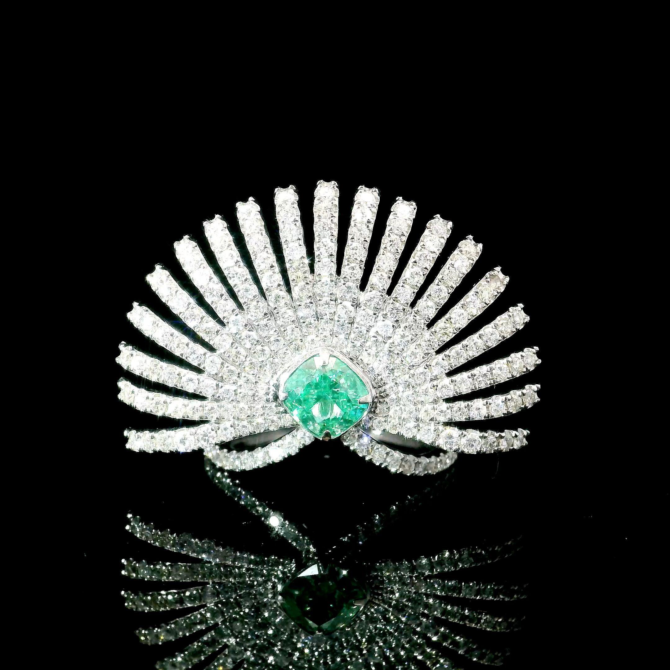 18kt white gold ring with diamonds
  
  Gold colour & Carat: White gold 18kt
  Weight: 5.53 grams
  
  Set with-
  Stone type: Diamonds
  Shape: Cushion
  Carat: 1.00 ct
  Colour: Very Light Green Yellow
  Clarity: SI1
  
  Surrounding Stones: