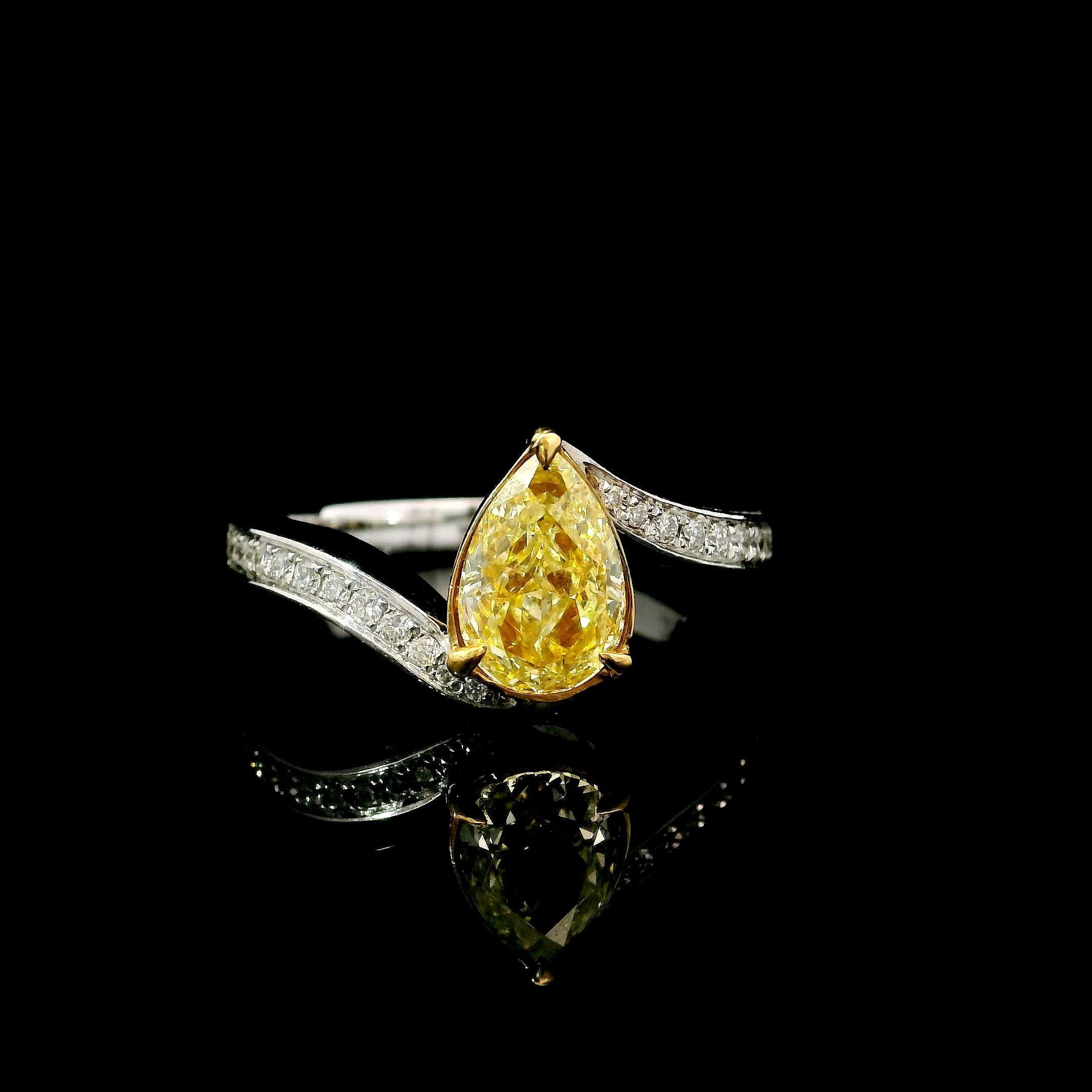 18kt white gold ring with diamonds
  
  Gold colour & karat: White gold 18kt
  Weight: 4.184 grams
  
  Set with-
  Stone type: Diamonds
  Shape: Pear
  Carat: 1.00 ct
  Colour: W - X Colour 
  Clarity: VS2
  
  Surrounding Stones: Diamonds
 1)