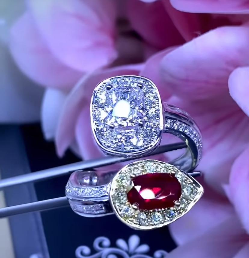A magnificent ring in contemporary design, so beautiful and sophisticated style, by Italian designer, a very impressive piece.
Ring come in 18K gold with a Natural Unheated Mozambique of 1,04 carats , in perfect oval cut,spectacular pigeon red color