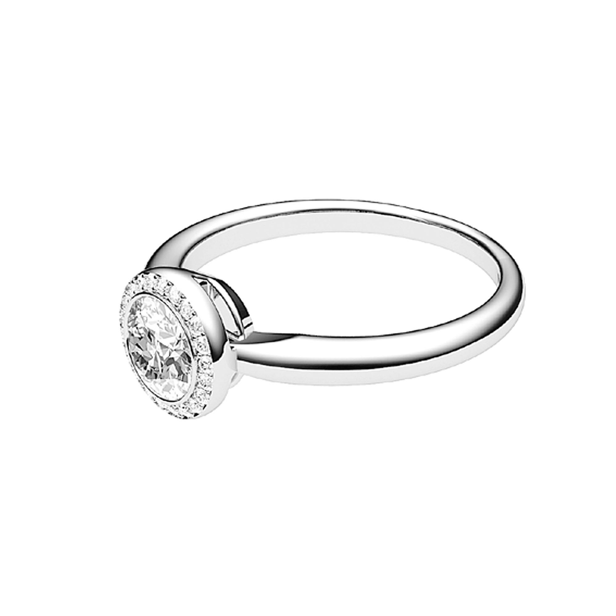 Elevate your style with the enchanting allure of the GIA Certified 1.00 Ct E-F Color VS Clarity Solitaire Round Diamond Halo Bezel Ring—a captivating blend of timeless elegance and contemporary sophistication. This exquisite piece features a
