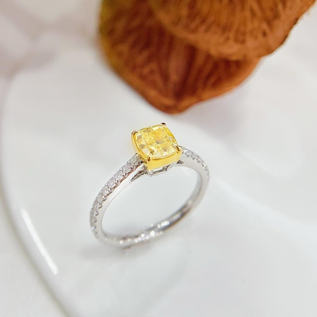 GIA Certified 1.00 CT Fancy Yellow Diamond 18K Gold Ring with Diamonds

1 Fancy Yellow Diamond - 1.00 CT
Diamonds - 0.26 CT

Total Weight - 3.08 GM

GIA Certification Attached