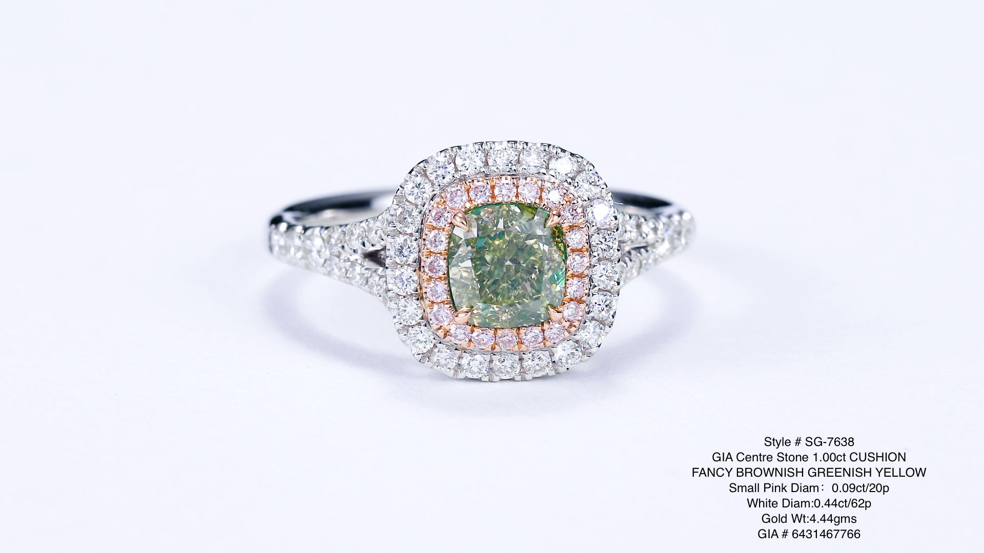 Indulge in the extraordinary allure of this breathtaking ring featuring a magnificent 1.00ct Fancy Brownish Greenish Yellow natural diamond. The cushion-shaped diamond boasts a mesmerising blend of earthy brown, green, and yellow tones, creating a