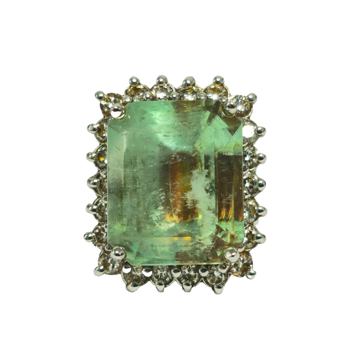 Elevate your style with our Ladies Contemporary Emerald Ring, boasting a breathtaking Colombian emerald set in lustrous white gold. Accented with dazzling round brilliant cut diamonds, this rare and one-of-a-kind piece exudes timeless elegance and