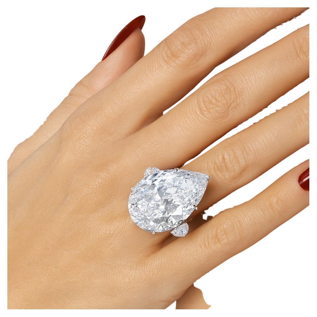 GIA Certified 10.01 Carat D VVS2 Pear Brilliant Cut Diamond Platinum Three-Stone Ring

Description:
A truly exceptional jewel, this magnificent ring centers a GIA certified pear brilliant cut diamond weighing 10.01 carats. Graded D color and VVS2