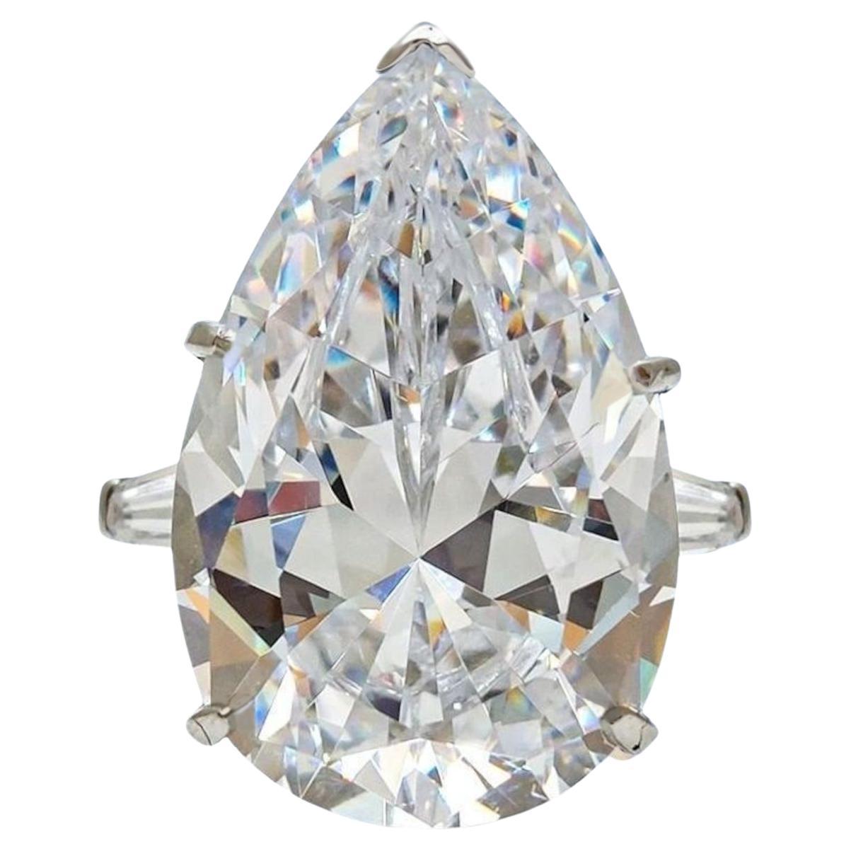 GIA Certified 10.01 Carat Pear Cut Diamond Ring with tapered baguette For Sale