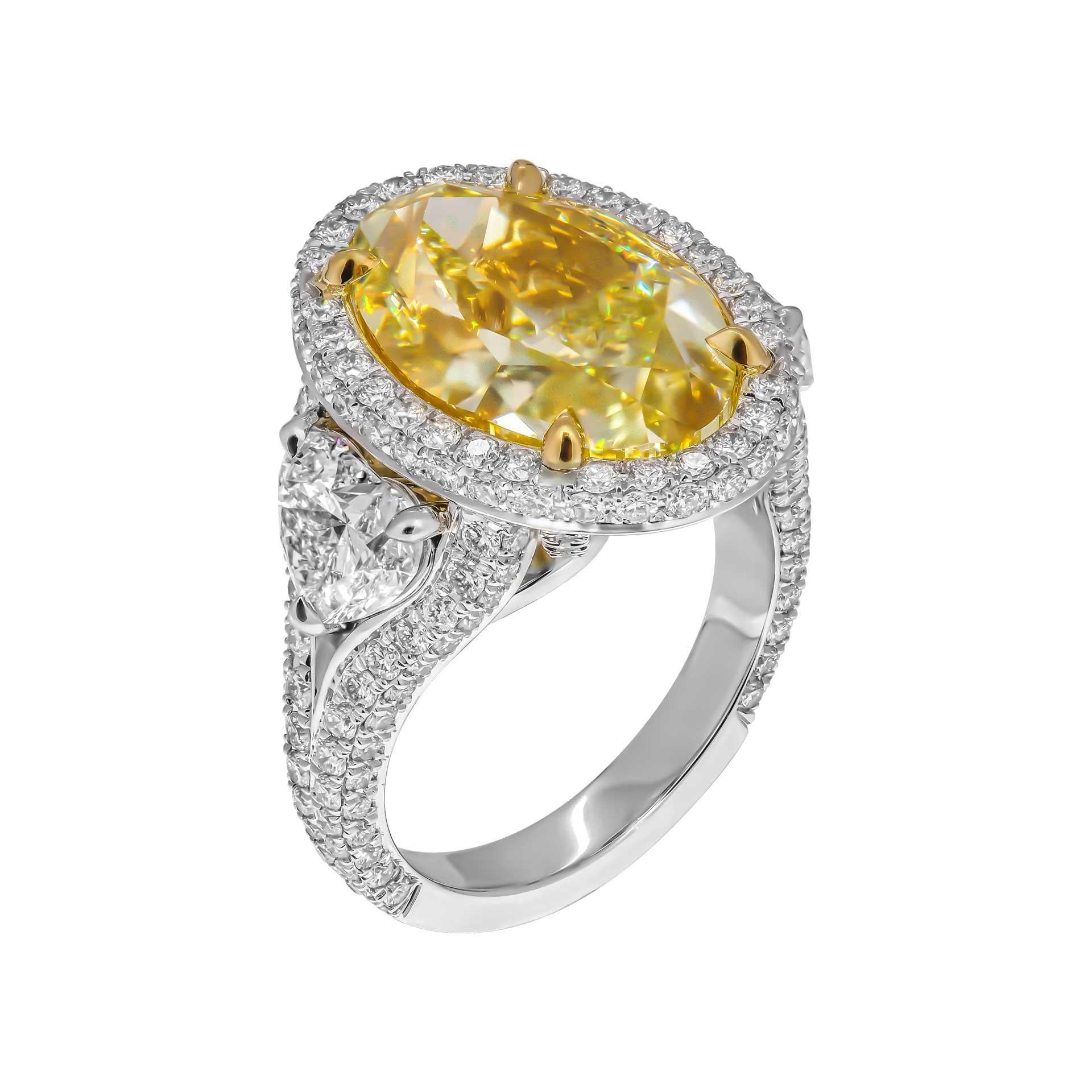 GIA Certified 10.01ct Oval Fancy Yellow Three-Stone Ring