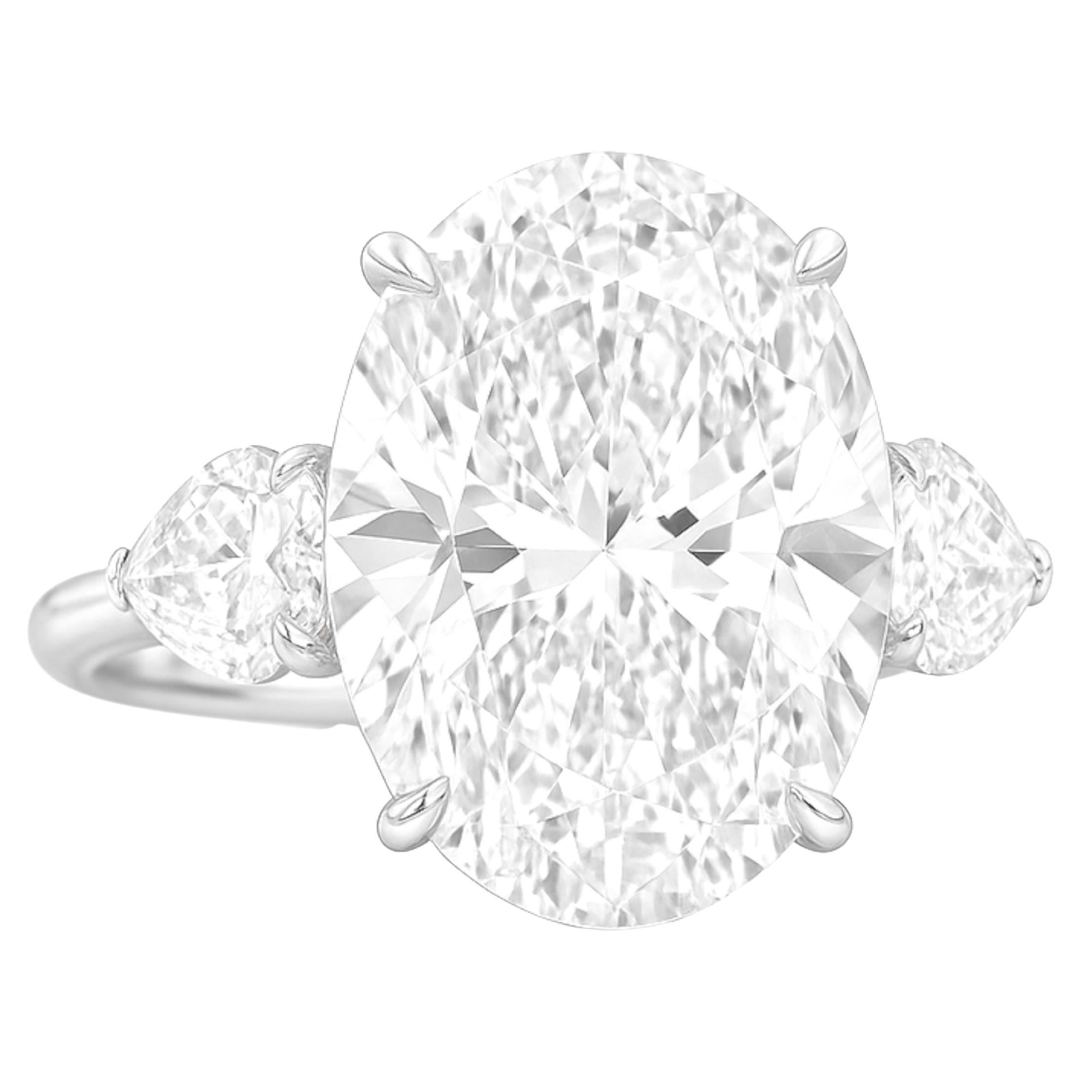 Anello con diamante ovale Brilliante certificato GIA da 10,04 carati D/VS1 e diamanti laterali Pear in platino

Una creazione straordinaria e senza tempo che mette in mostra un diamante ovale brillante certificato GIA da 10,04 carati, di colore D e