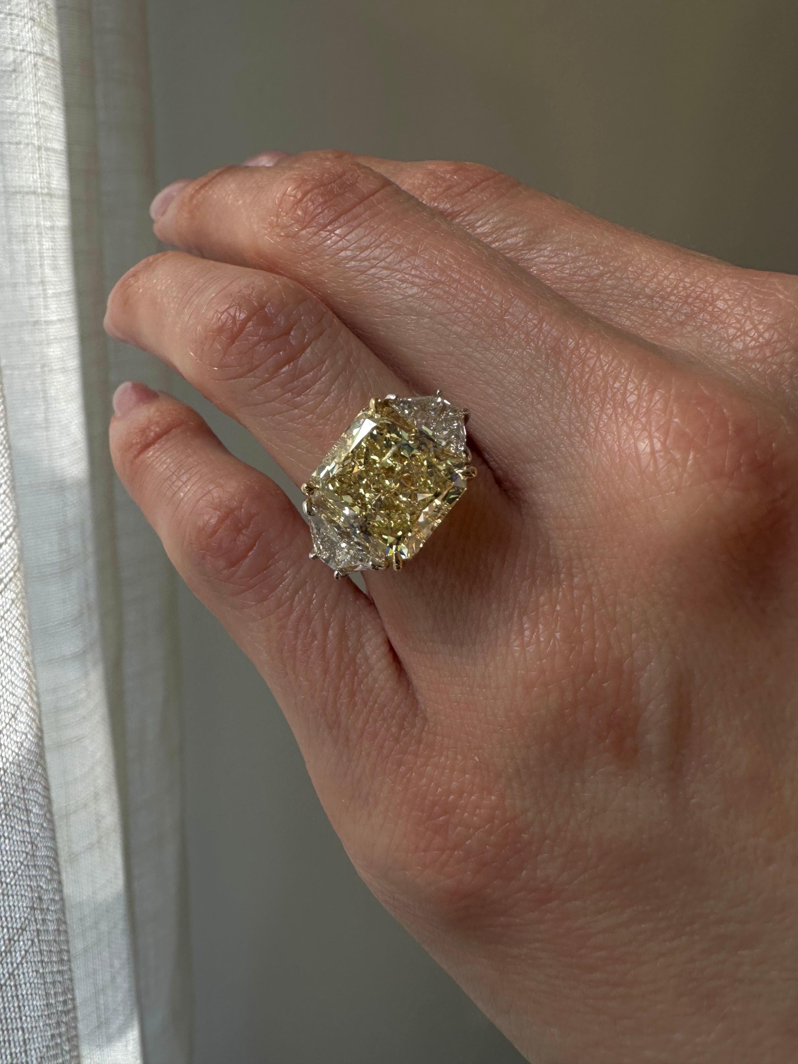 Radiant Cut GIA Certified 10.05 Carat Fancy Yellow Diamond Three Stone Ring For Sale